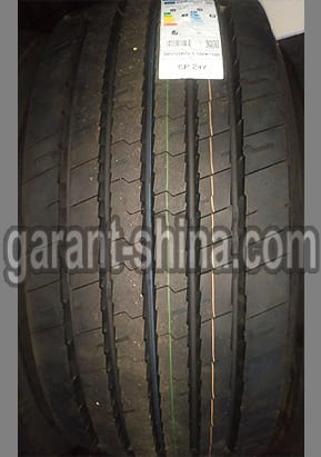 Dunlop SP247 (прицепная) 385/55 R22.5 160K(158L) 20PR - Фото протектора с этикеткой